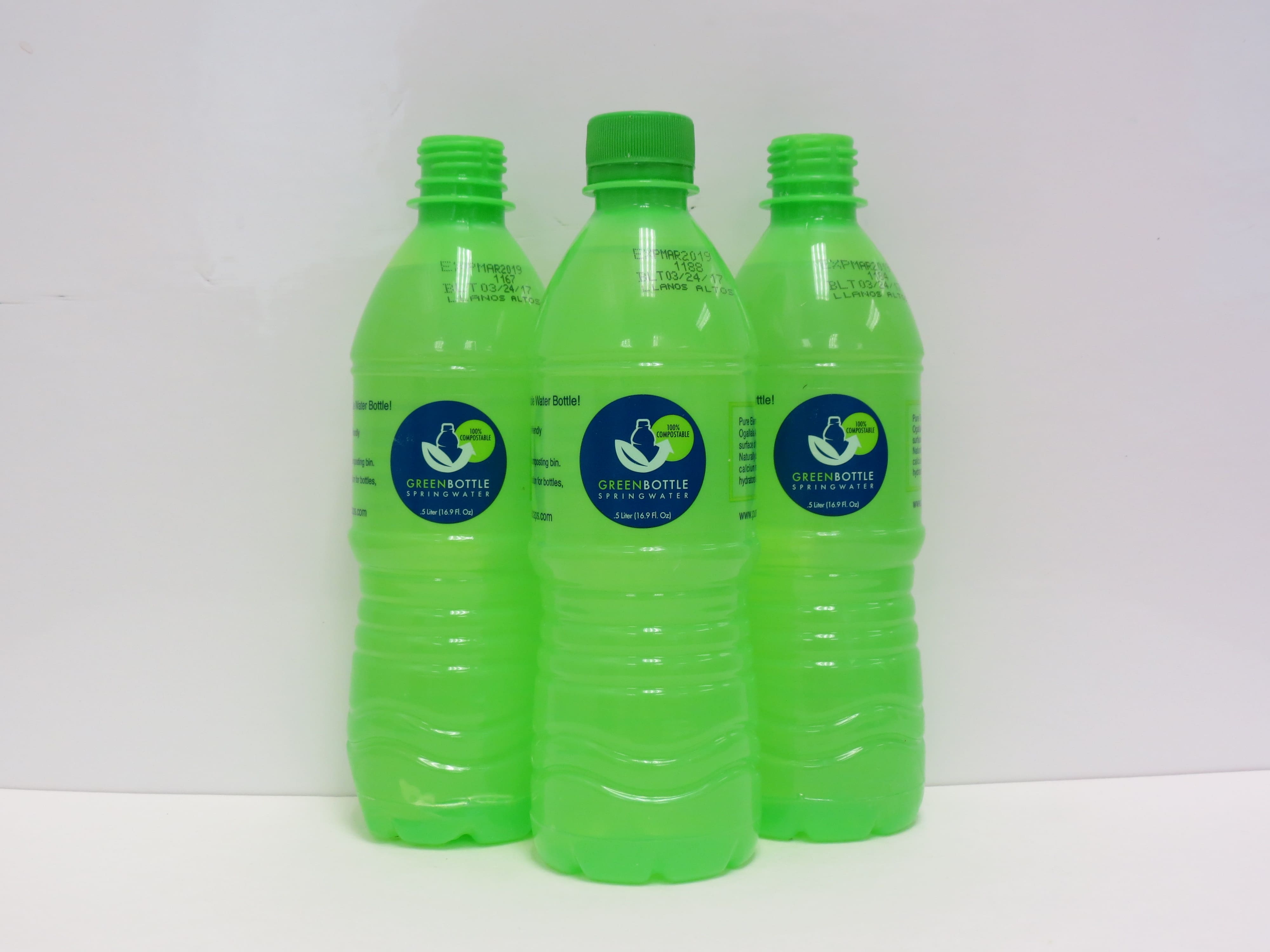 Water bottle store with green cap